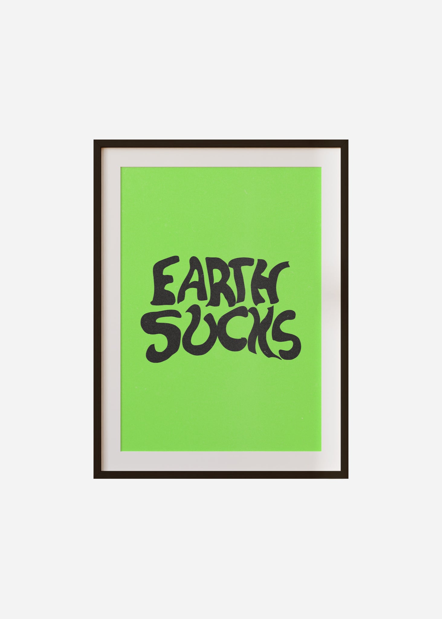 earth sucks Framed & Mounted Print
