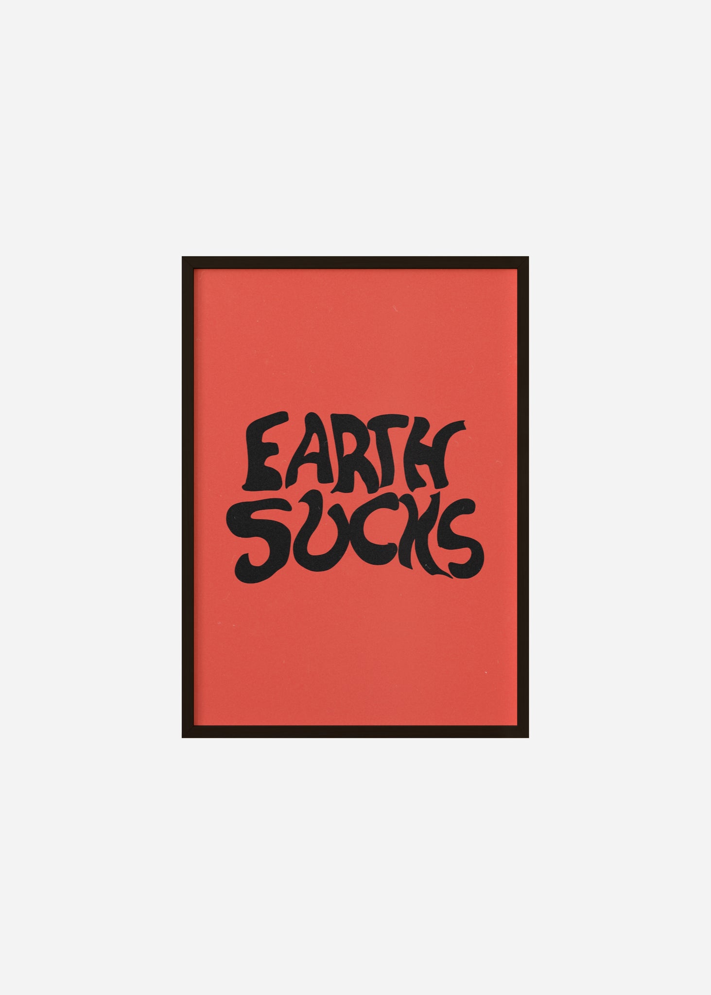 earth sucks Framed Print