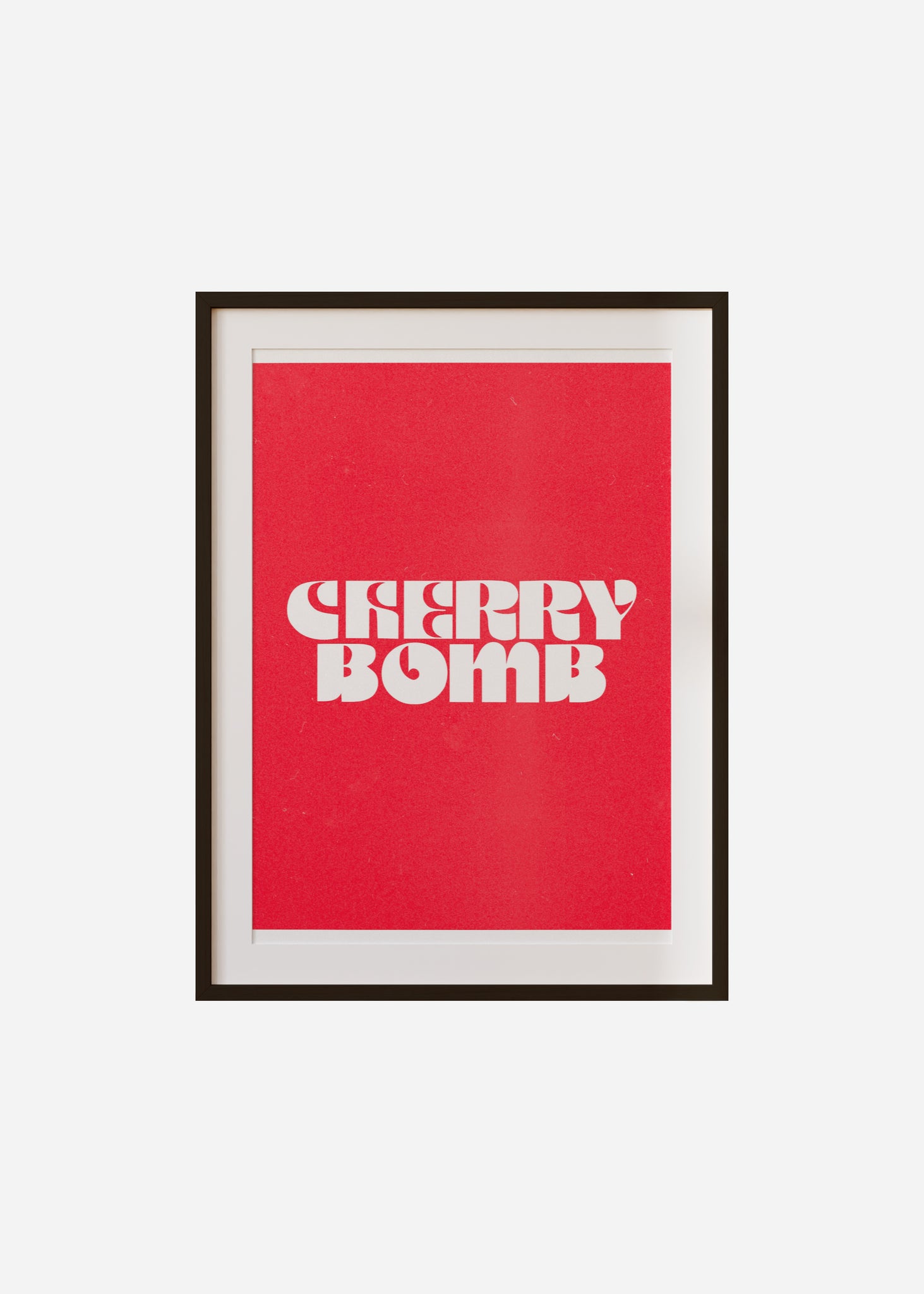 cherry bomb Framed & Mounted Print