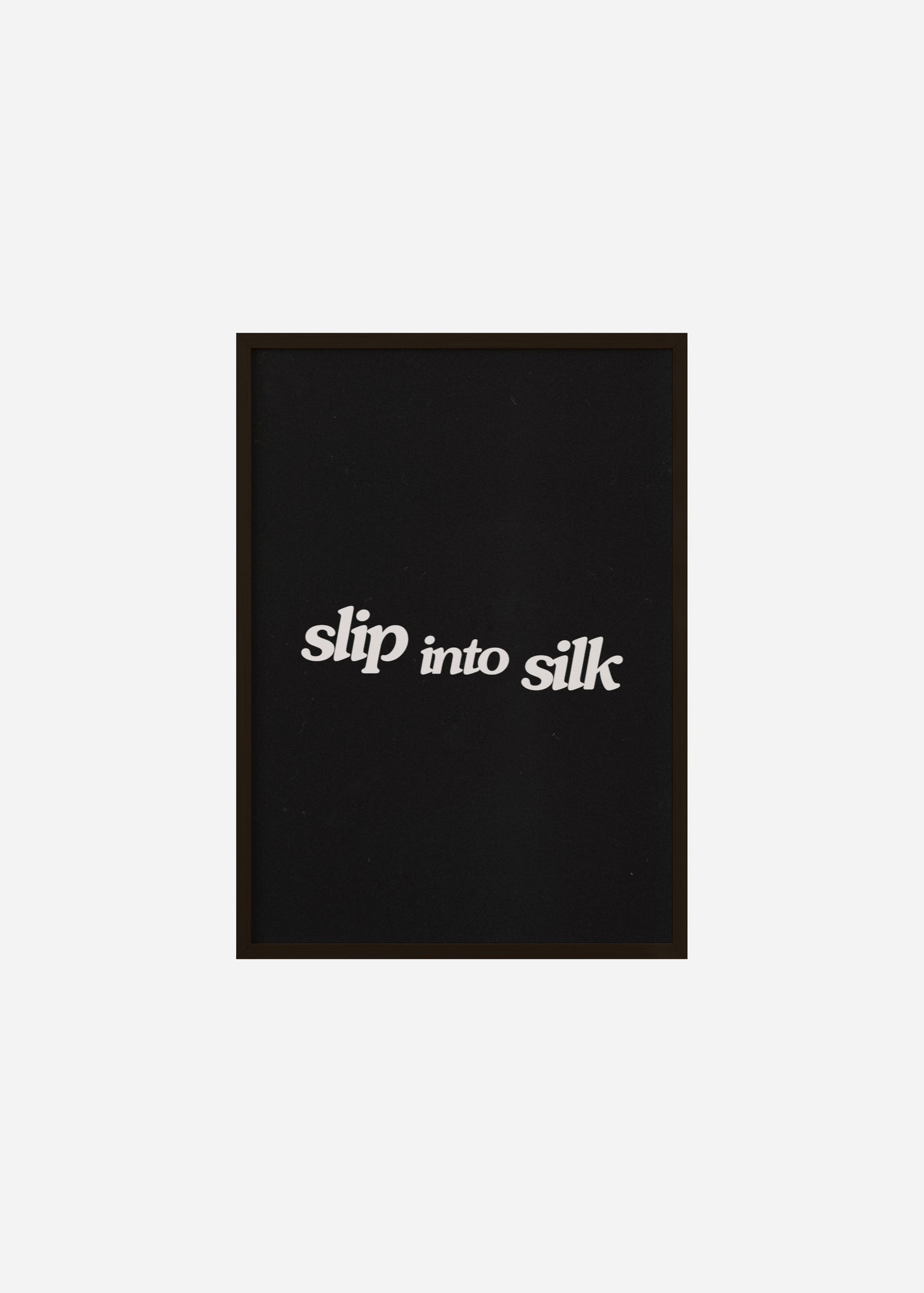 Slip into silk Framed Print